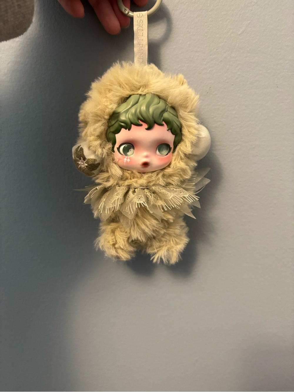 Plush Cream Faux Fur Keychain Charm with Green-Accented Face